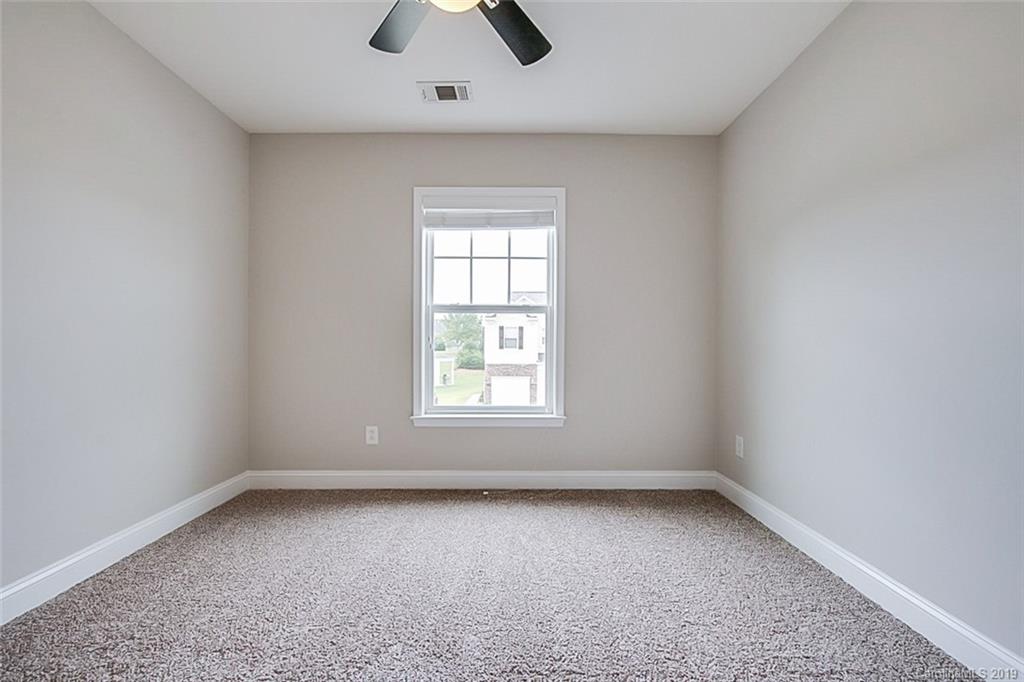 234 River Clay Road Fort Mill, SC 29708 - Photo 10 of 15 an empty room with a window