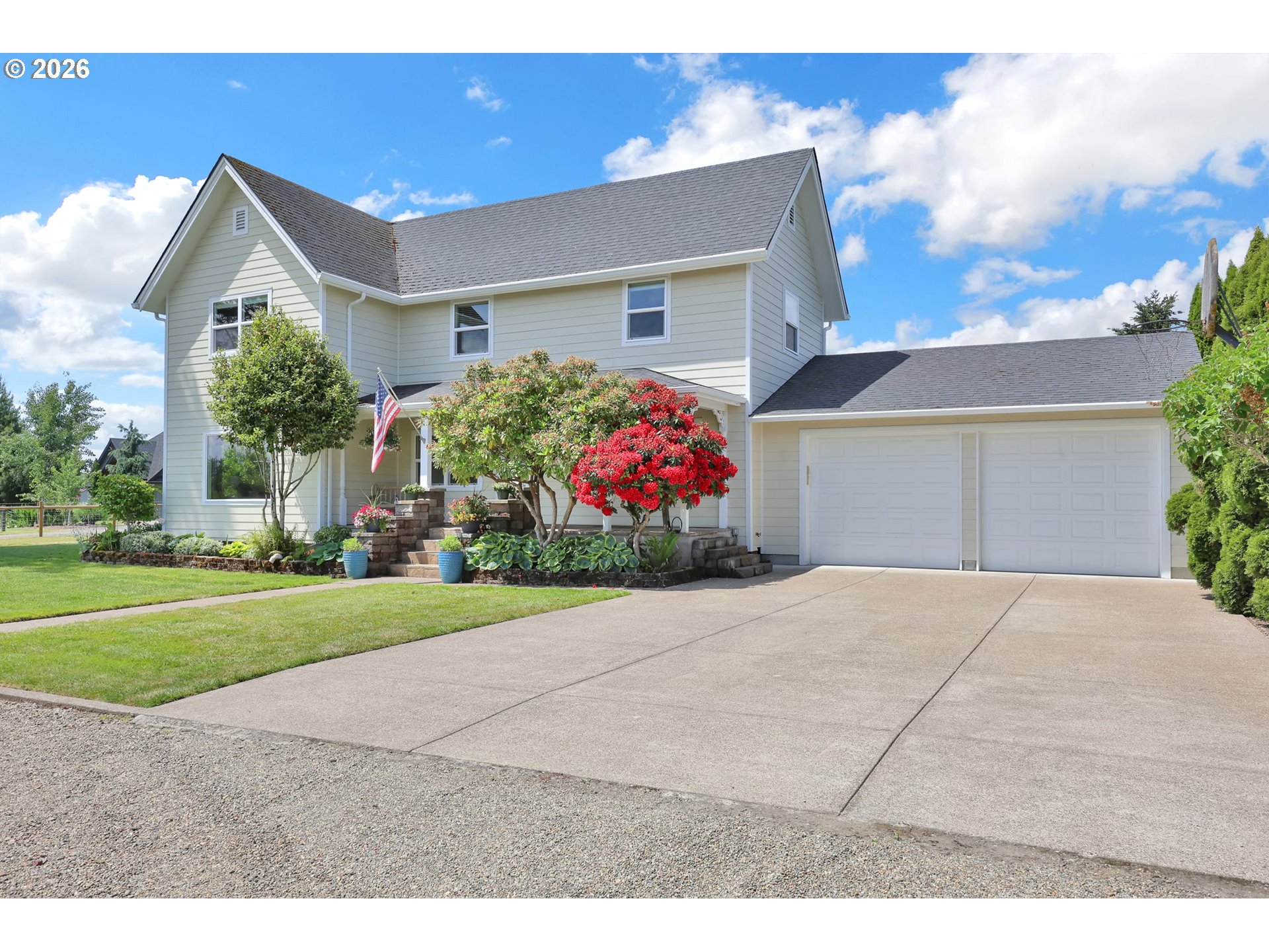 90440 Goodman Road Junction City, OR 97448 - Photo 2 of 48 a front view of house with a yard