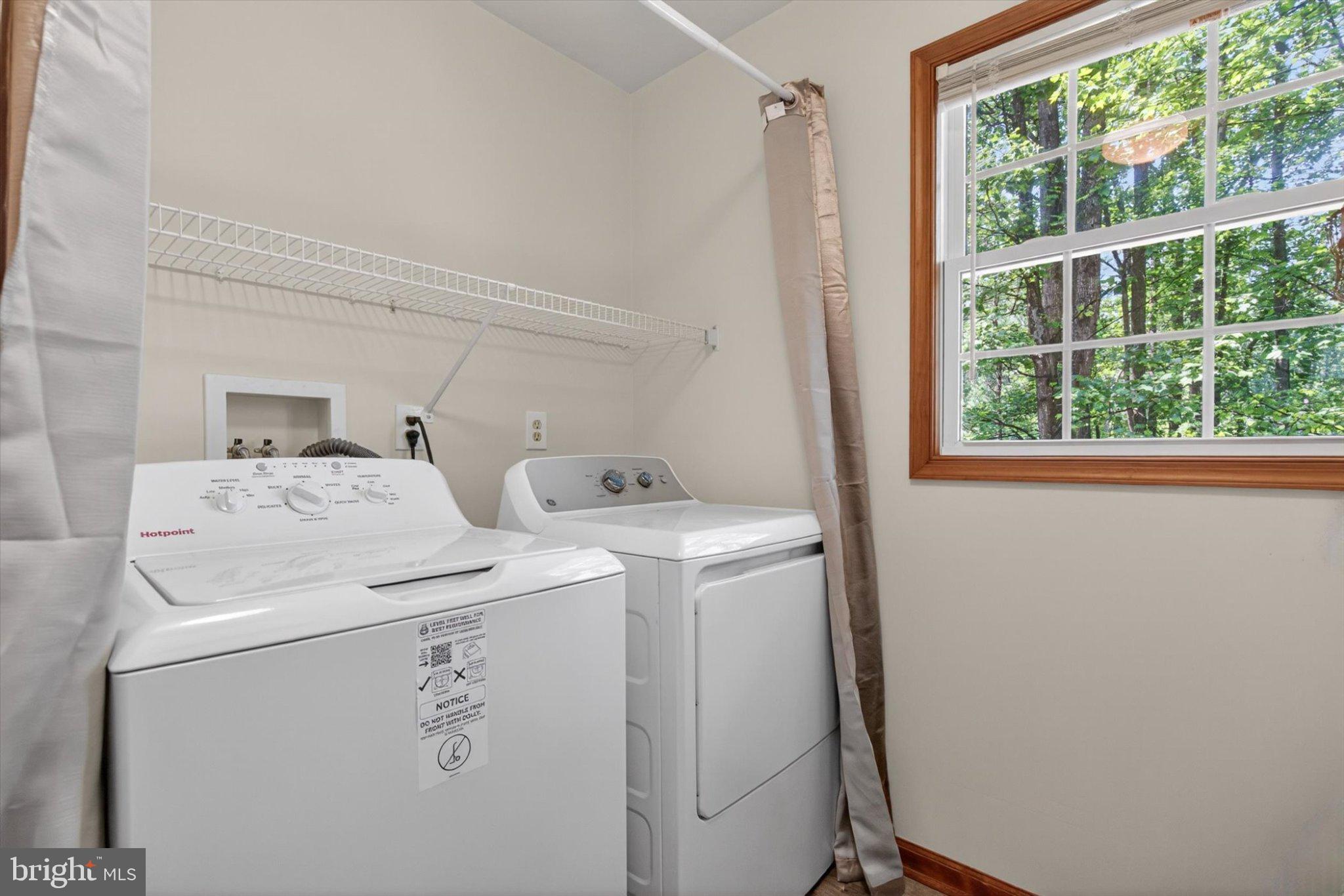 802 Hollow Road Delta, PA 17314 - Photo 23 of 45 Bright laundry space with nature views.