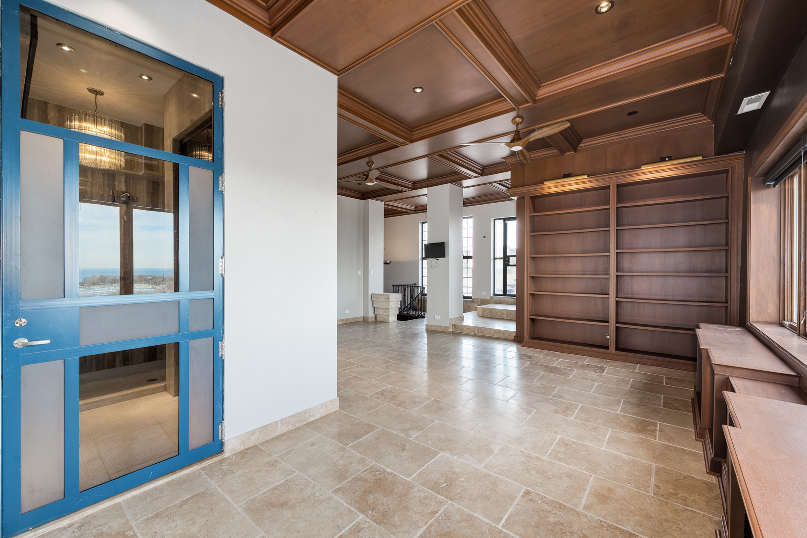 707 West Jr Terrace, Unit PH12 Chicago, IL 60613 - Photo 29 of 41 a view of empty room with wooden walls