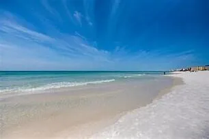 a view of a golf course with green space