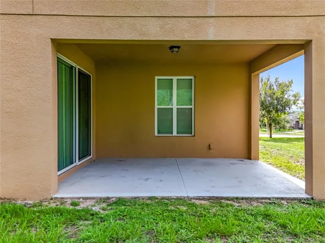 a view of backyard with green space