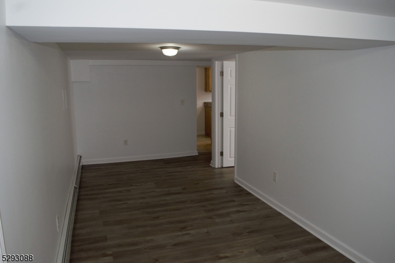 55 Highway 23, Unit 2 Hamburg, NJ 07419 - Photo 4 of 11 a view of a hallway with wooden floor