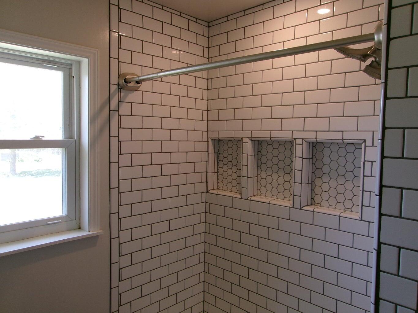 1201 Borger Plainview, TX 79072 - Photo 16 of 22 a bathroom with a shower