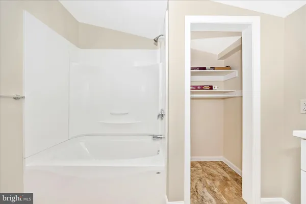 a bathroom with a bathtub