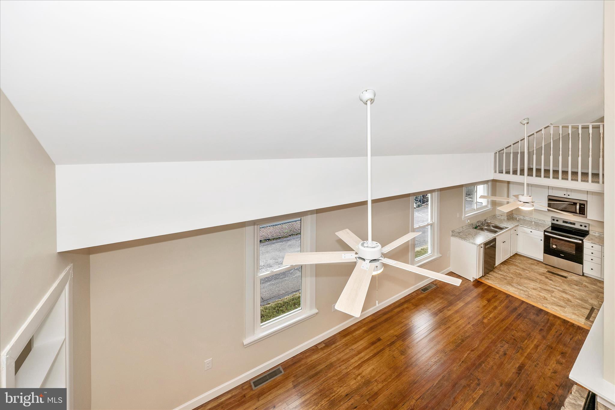 12401 Cedar Ridge Road Williamsport, MD 21795 - Photo 38 of 54 Living Room & Kitchen View from Loft
