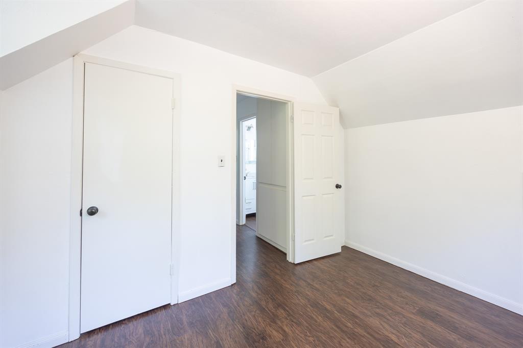 925 Angies Crossing Tool, TX 75143 - Photo 19 of 25 a view of an empty room with wooden floor