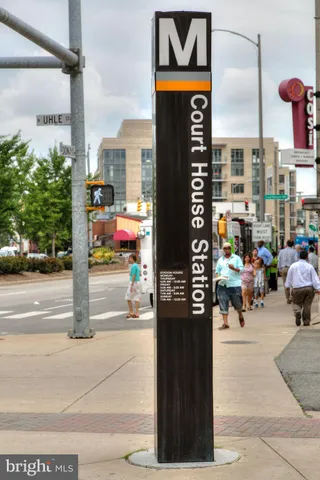 a view of a swimming pool with a outdoor seating