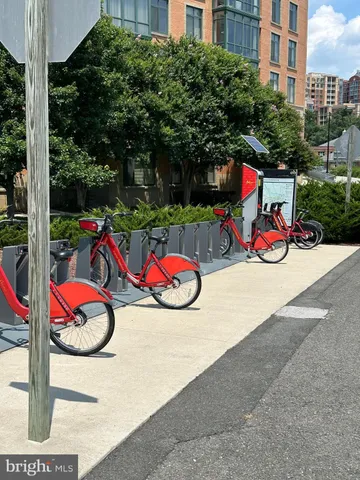 a view of a street with parking