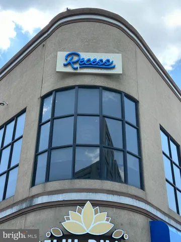 a view of a pathway both side of house