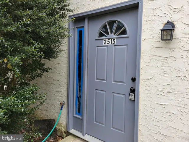 a front view of a house with garage