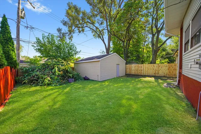 a view of backyard with green space