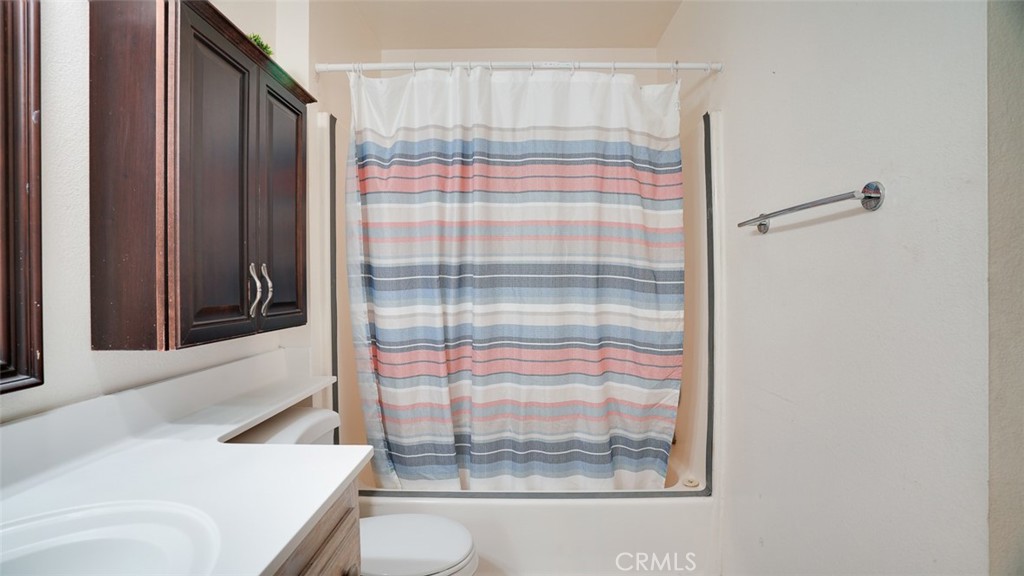 833 Cinnamon Lane, Unit 4 Duarte, CA 91010 - Photo 20 of 34 a bathroom with a sink and a shower