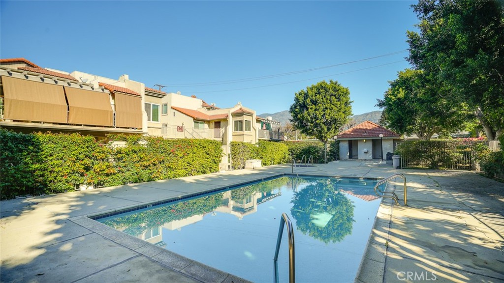 833 Cinnamon Lane, Unit 4 Duarte, CA 91010 - Photo 31 of 34 a view of a large pool with a patio