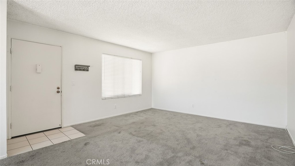 833 Cinnamon Lane, Unit 4 Duarte, CA 91010 - Photo 4 of 34 an empty room with windows