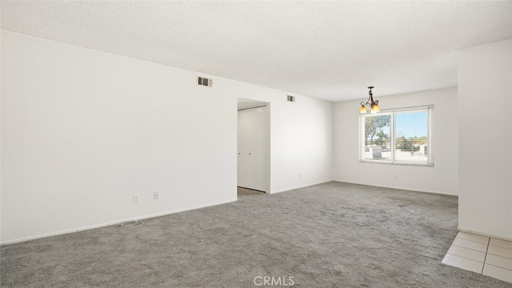 833 Cinnamon Lane, Unit 4 Duarte, CA 91010 - Photo 6 of 34 an empty room with a window