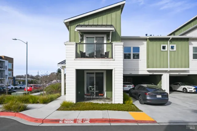 a view of house with outdoor space and swimming pool