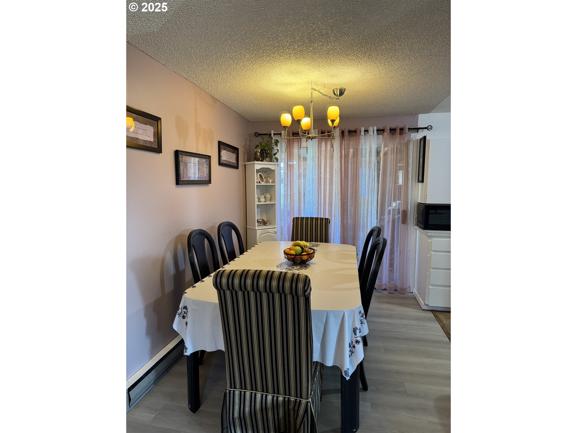 3398 Southwest 125th Avenue Beaverton, OR 97005 - Photo 11 of 25 a view of a dining room with furniture