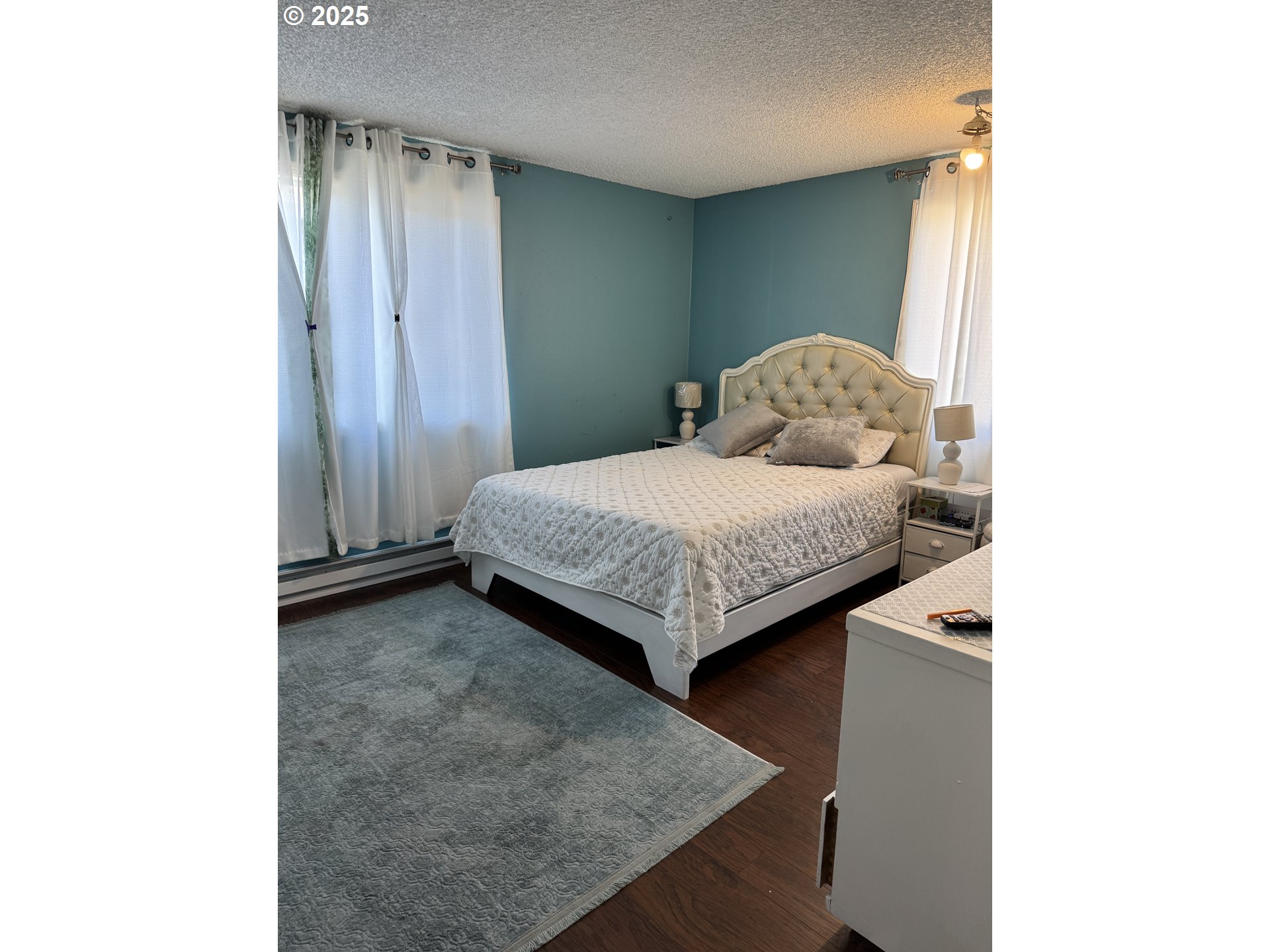 3398 Southwest 125th Avenue Beaverton, OR 97005 - Photo 16 of 25 a bedroom with a bed and a window