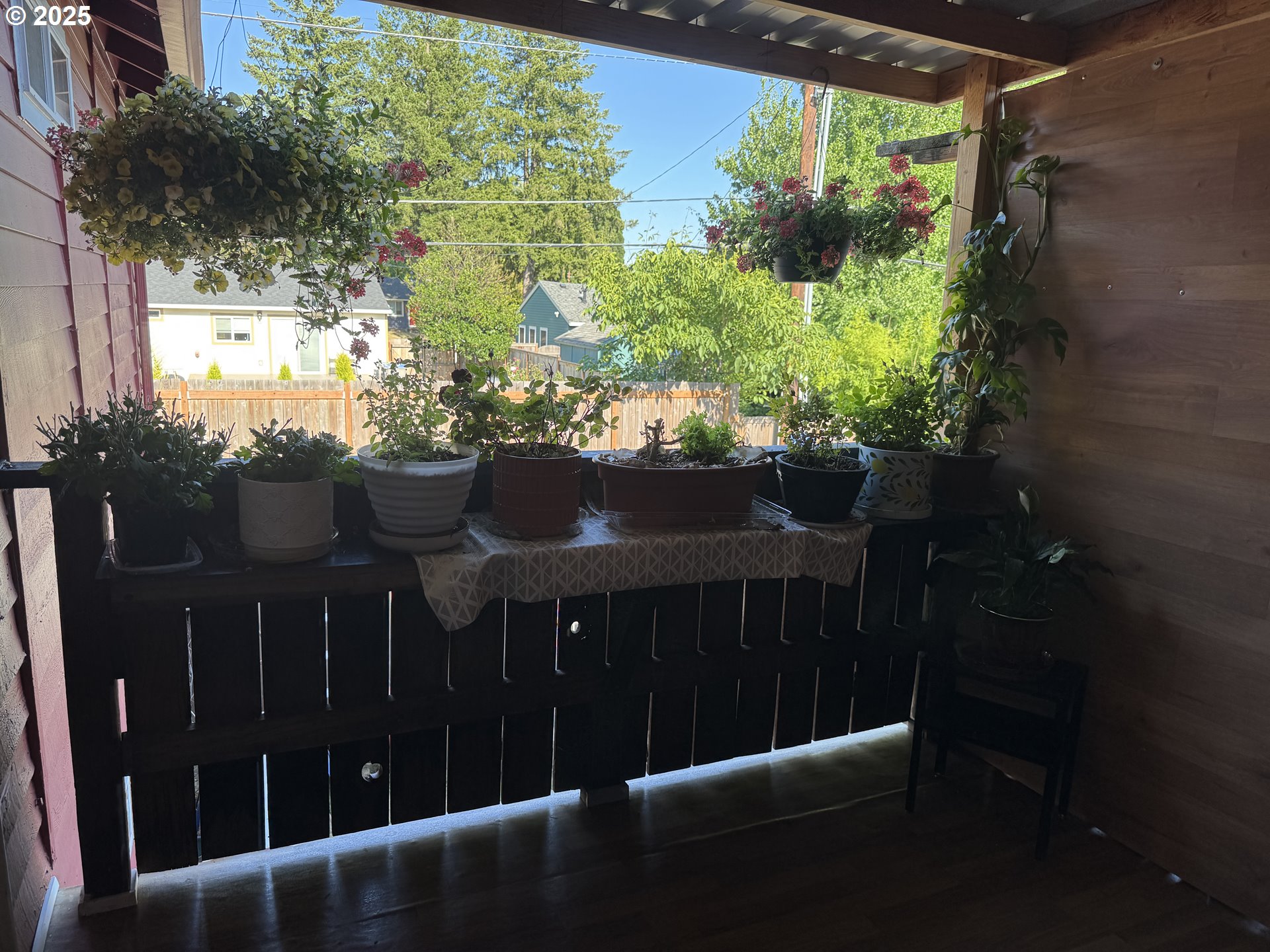 3398 Southwest 125th Avenue Beaverton, OR 97005 - Photo 21 of 25 a view of balcony with wooden floor and outdoor seating