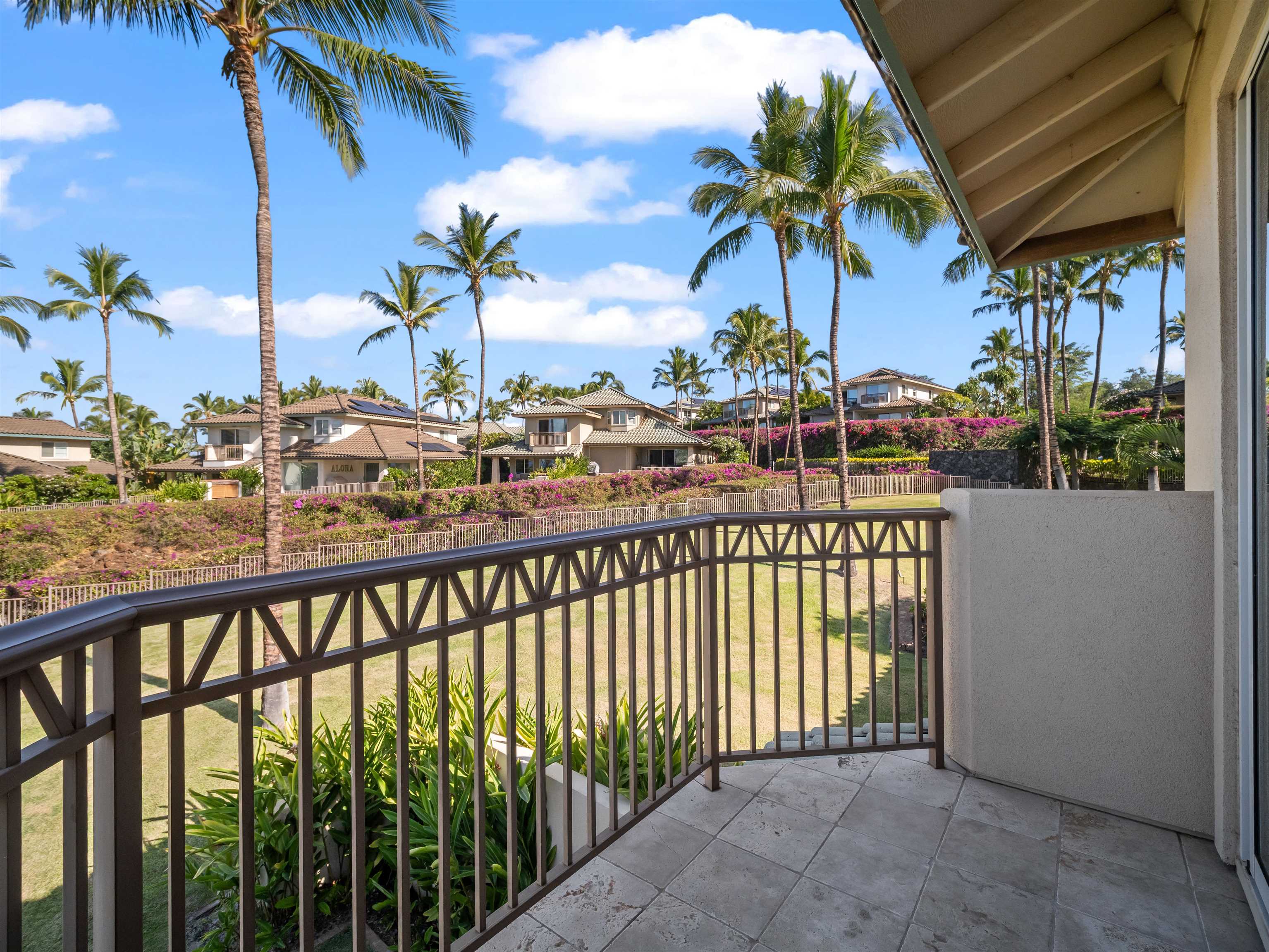 28 Kai La Place, Unit 19A Kihei, HI 96753 - Photo 16 of 49 a view of a balcony with palm trees