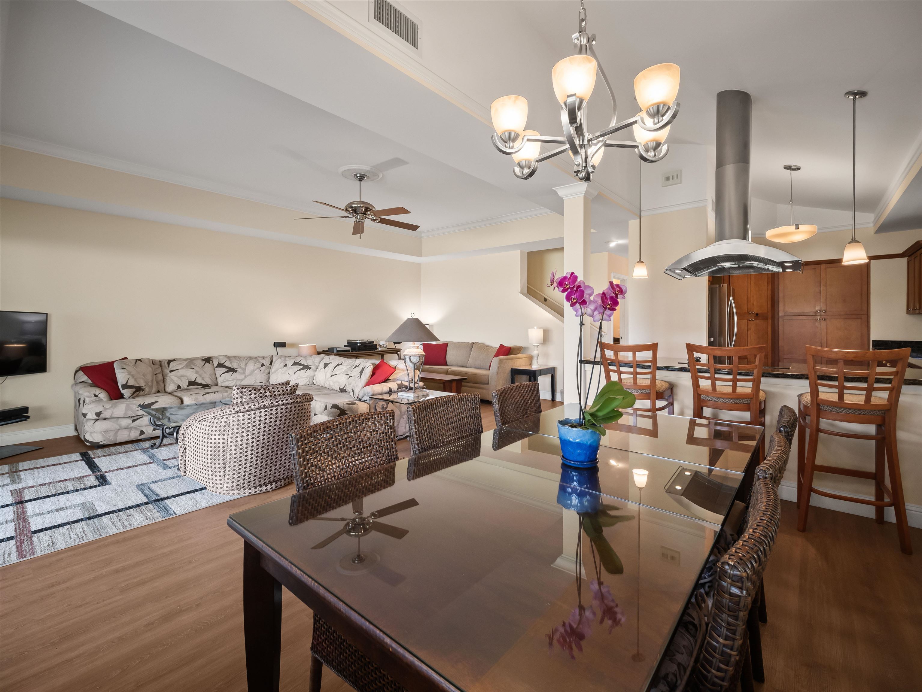 28 Kai La Place, Unit 19A Kihei, HI 96753 - Photo 2 of 49 a view of a dining room with furniture and wooden floor