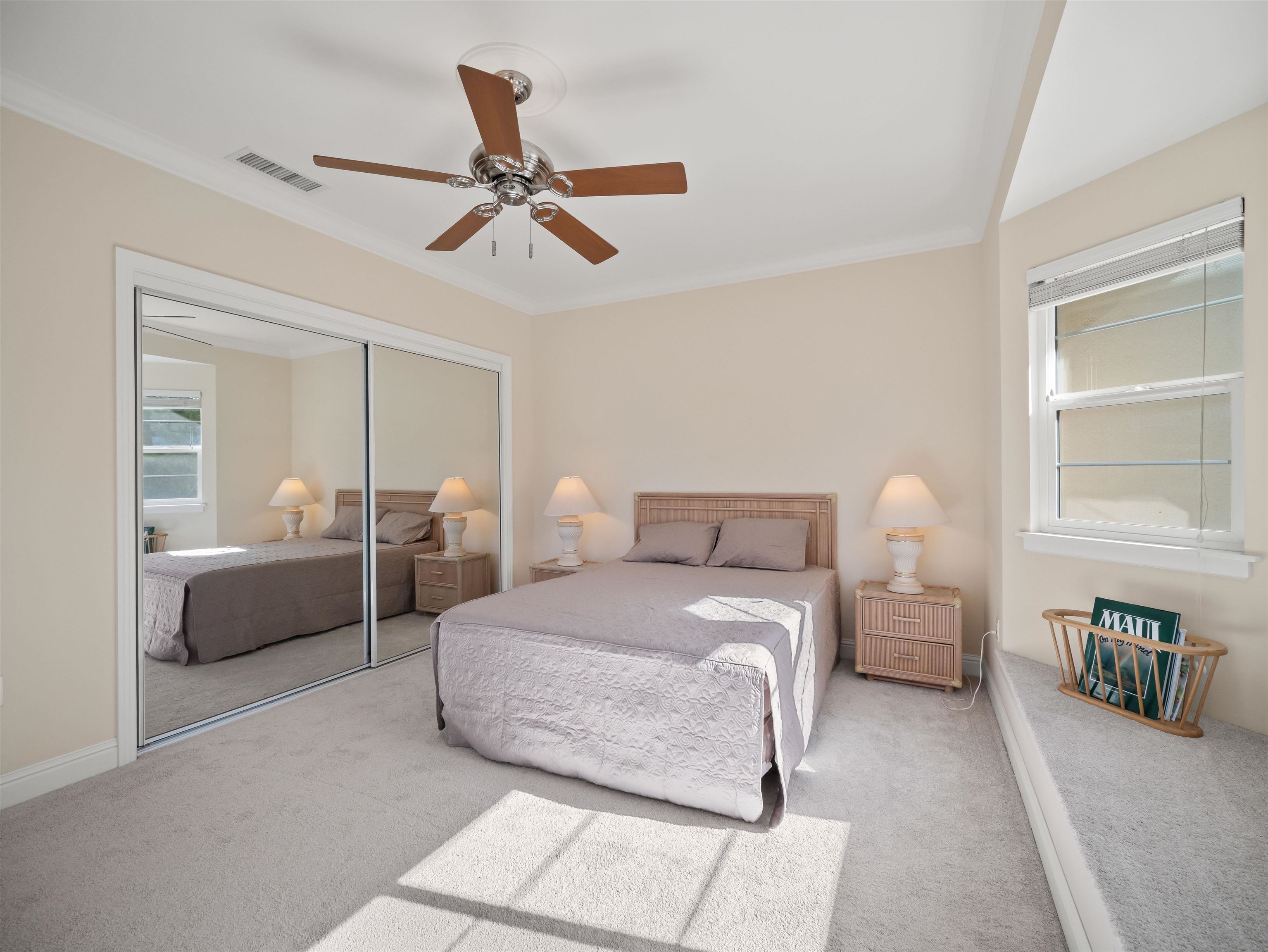 28 Kai La Place, Unit 19A Kihei, HI 96753 - Photo 27 of 49 a bedroom with bed couch and window