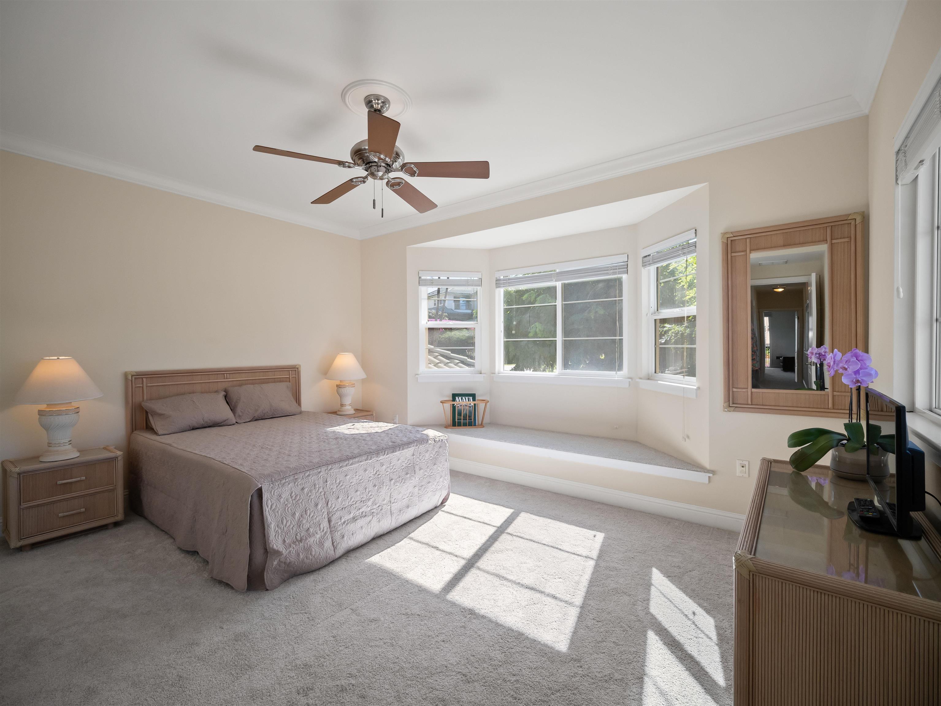 28 Kai La Place, Unit 19A Kihei, HI 96753 - Photo 29 of 49 a spacious bedroom with a bed a couch and a window