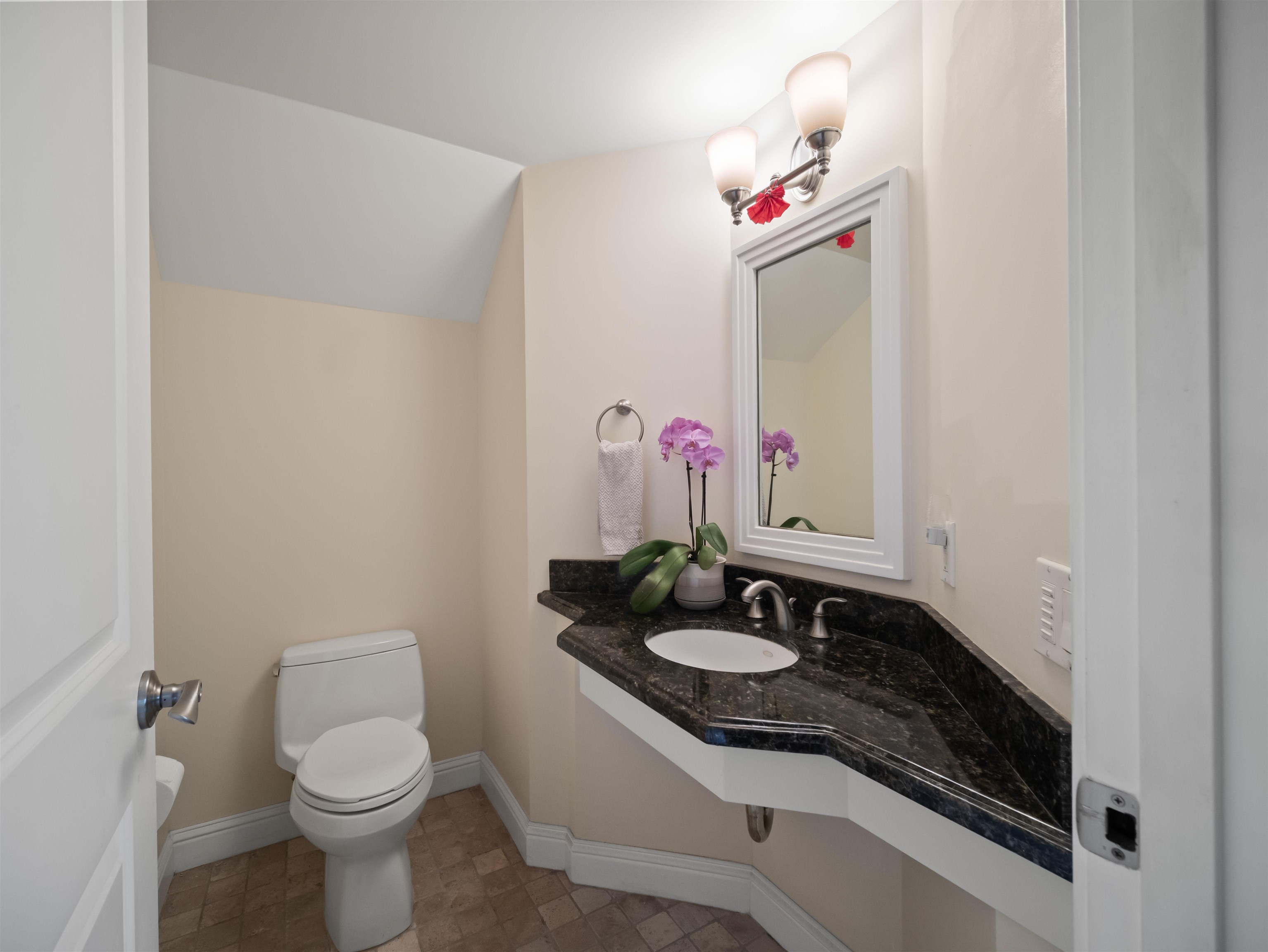 28 Kai La Place, Unit 19A Kihei, HI 96753 - Photo 35 of 49 a bathroom with a sink and a toilet