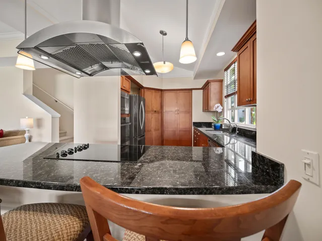 a view of a living room and kitchen