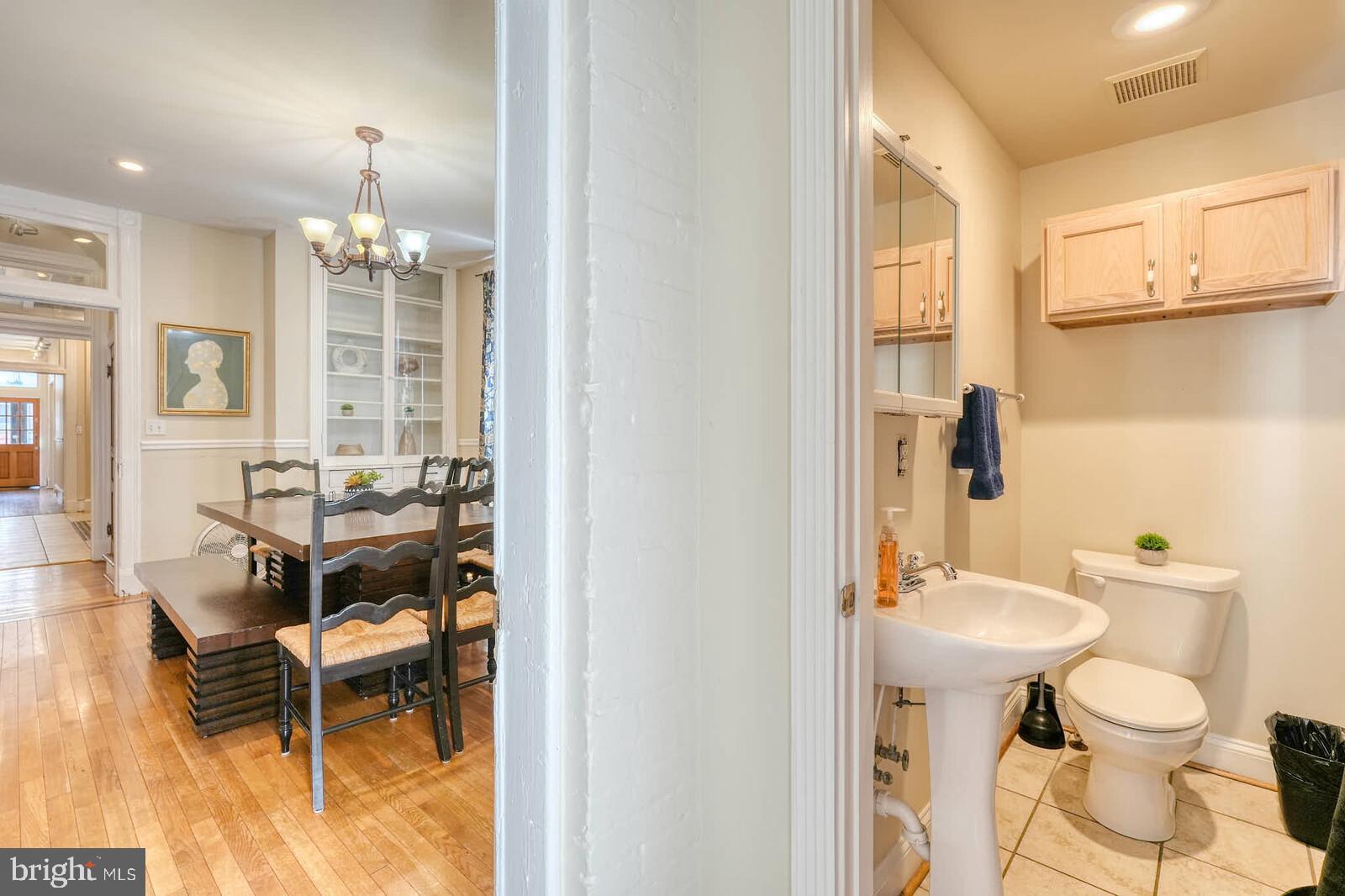 1402 Light Street Baltimore, MD 21230 - Photo 20 of 60 a bathroom with a sink and a mirror