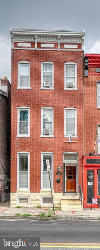 1402 Light Street Baltimore, MD 21230 - Photo 2 of 60 a front view of a house