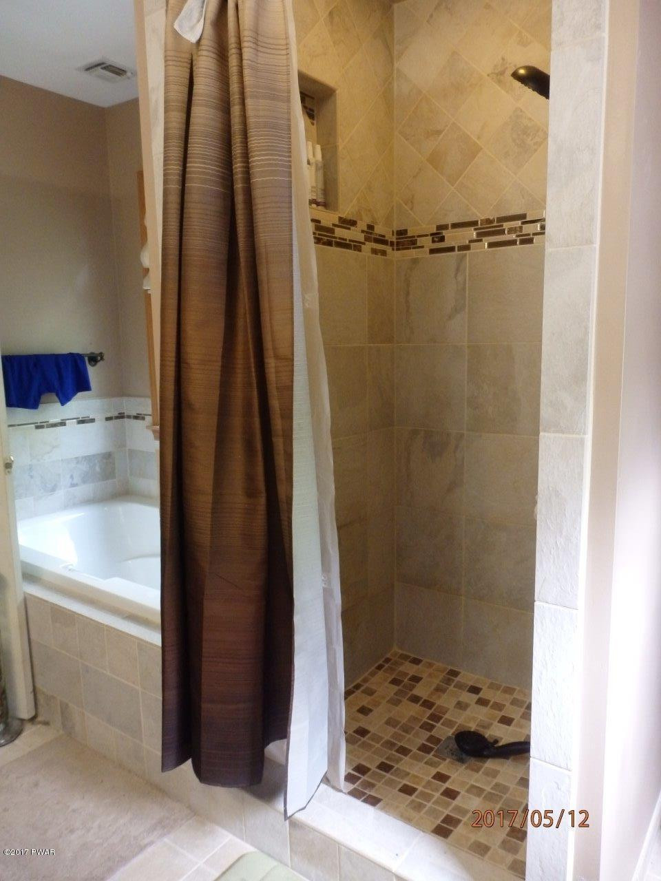 271 Sawmill Road Greentown, PA 18426 - Photo 18 of 36 a bathroom with a shower