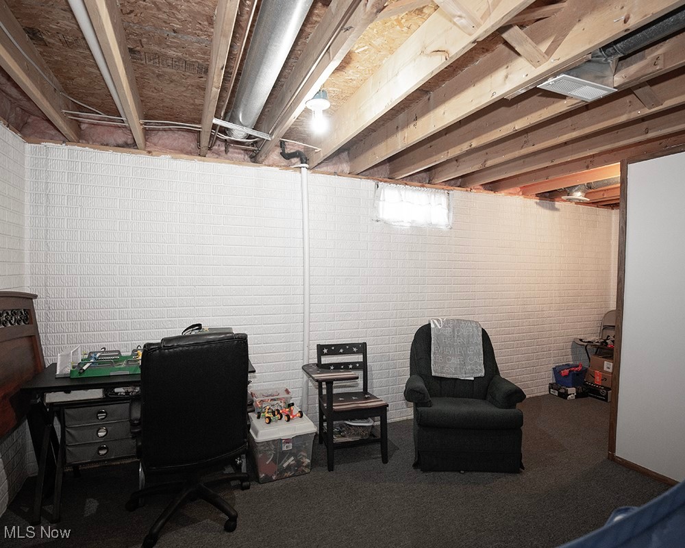 1614 South Abbe Road Elyria, OH 44035 - Photo 31 of 35 Office with carpet and brick wall