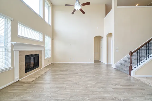 a kitchen with stainless steel appliances granite countertop a stove top oven microwave and sink