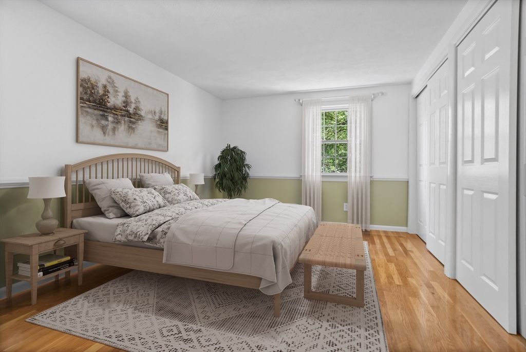 94 Codman Road Lincoln, MA 01773 - Photo 8 of 22 a bedroom with a bed and a painting on the wall