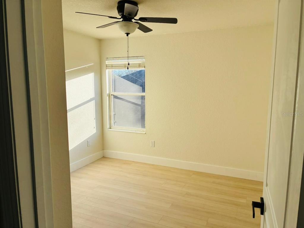 13225 Charfield Street Windermere, FL 34786 - Photo 19 of 40 a view of an empty room with a window