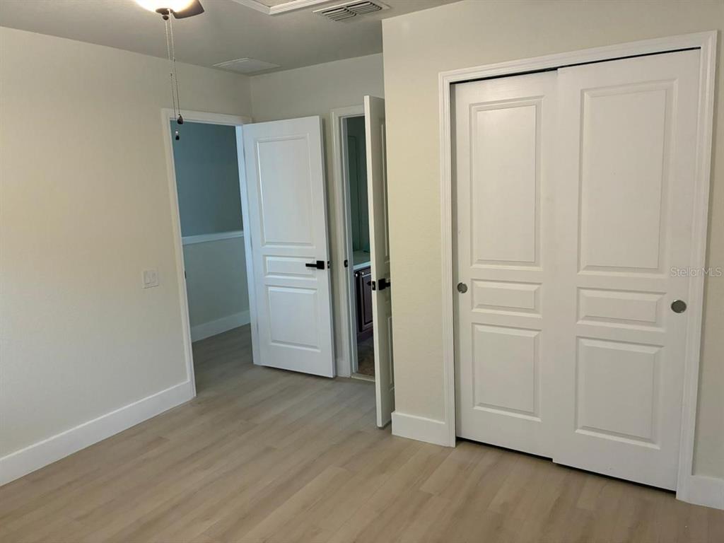 13225 Charfield Street Windermere, FL 34786 - Photo 23 of 40 an empty room with closet area