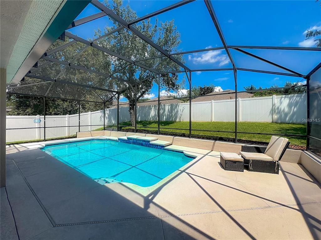 13225 Charfield Street Windermere, FL 34786 - Photo 34 of 40 a view of a backyard with sitting area
