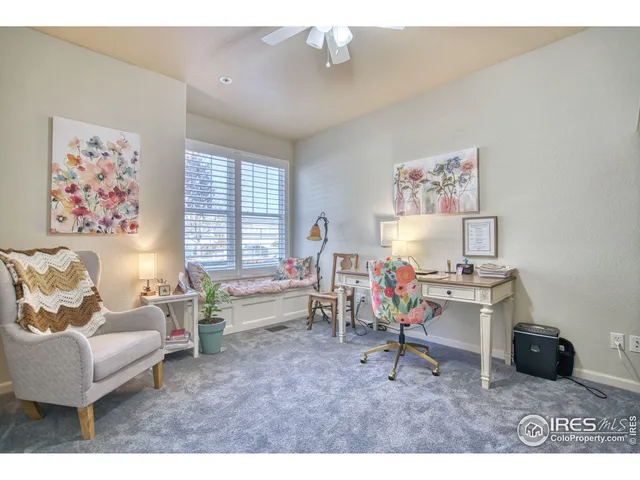 a view of a house with a yard and garage