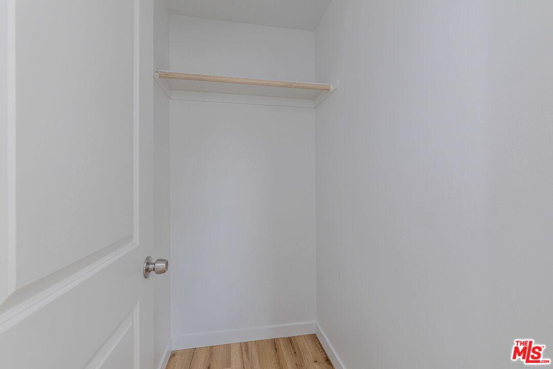 1105 East 103rd Place Los Angeles, CA 90002 - Photo 29 of 56 a view of bathroom with white paint wall