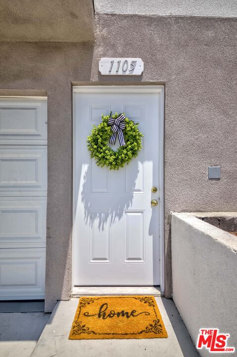 1105 East 103rd Place Los Angeles, CA 90002 - Photo 9 of 56 a view of door with an outdoor space
