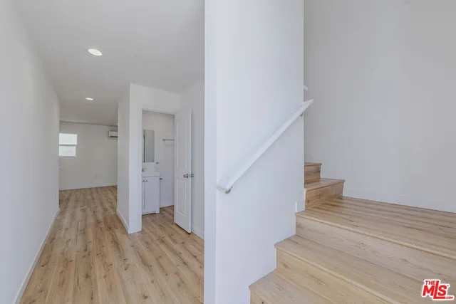 a view of kitchen with wooden floor