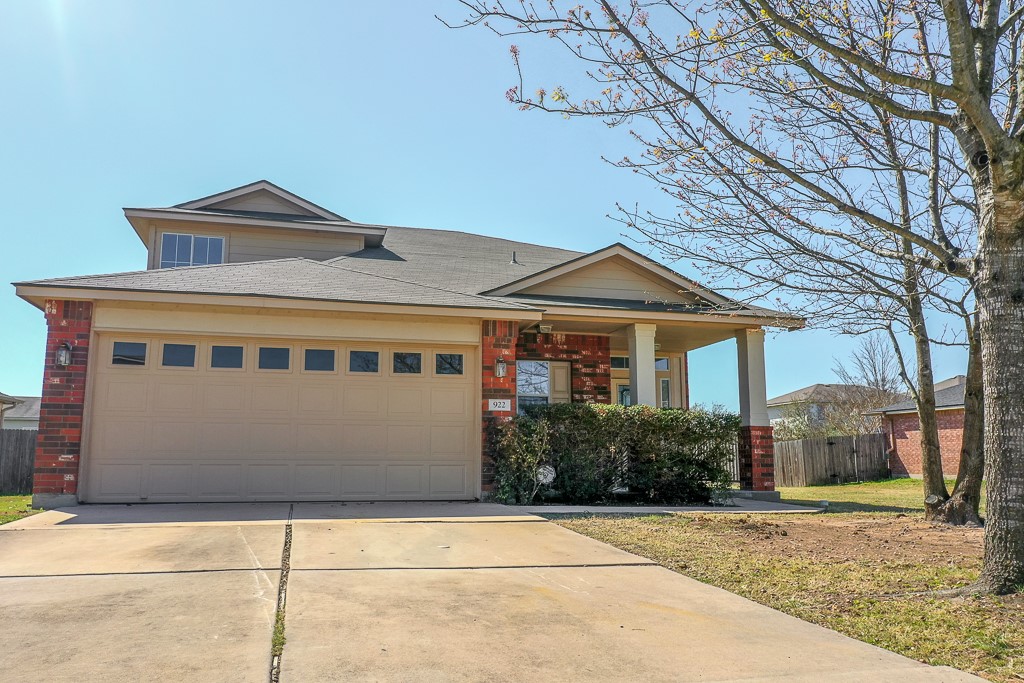 a front view of house with yard