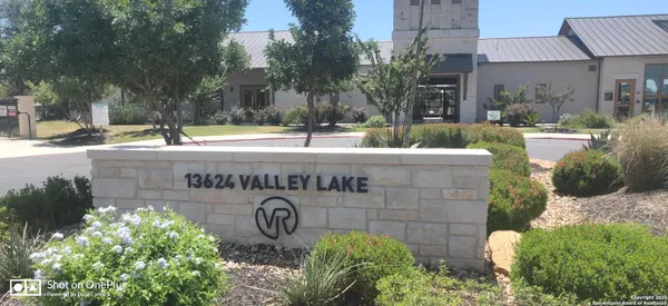 a view of street with small shops