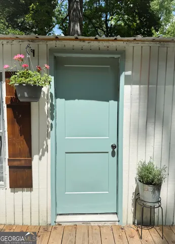 a view of balcony and garden