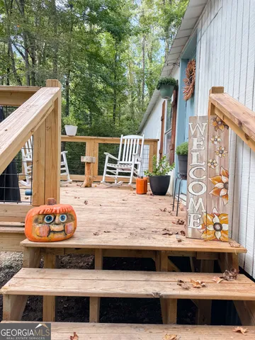 a view of outdoor kitchen with stainless steel appliances
