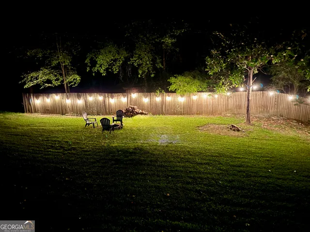 a view of a golf course with a yard