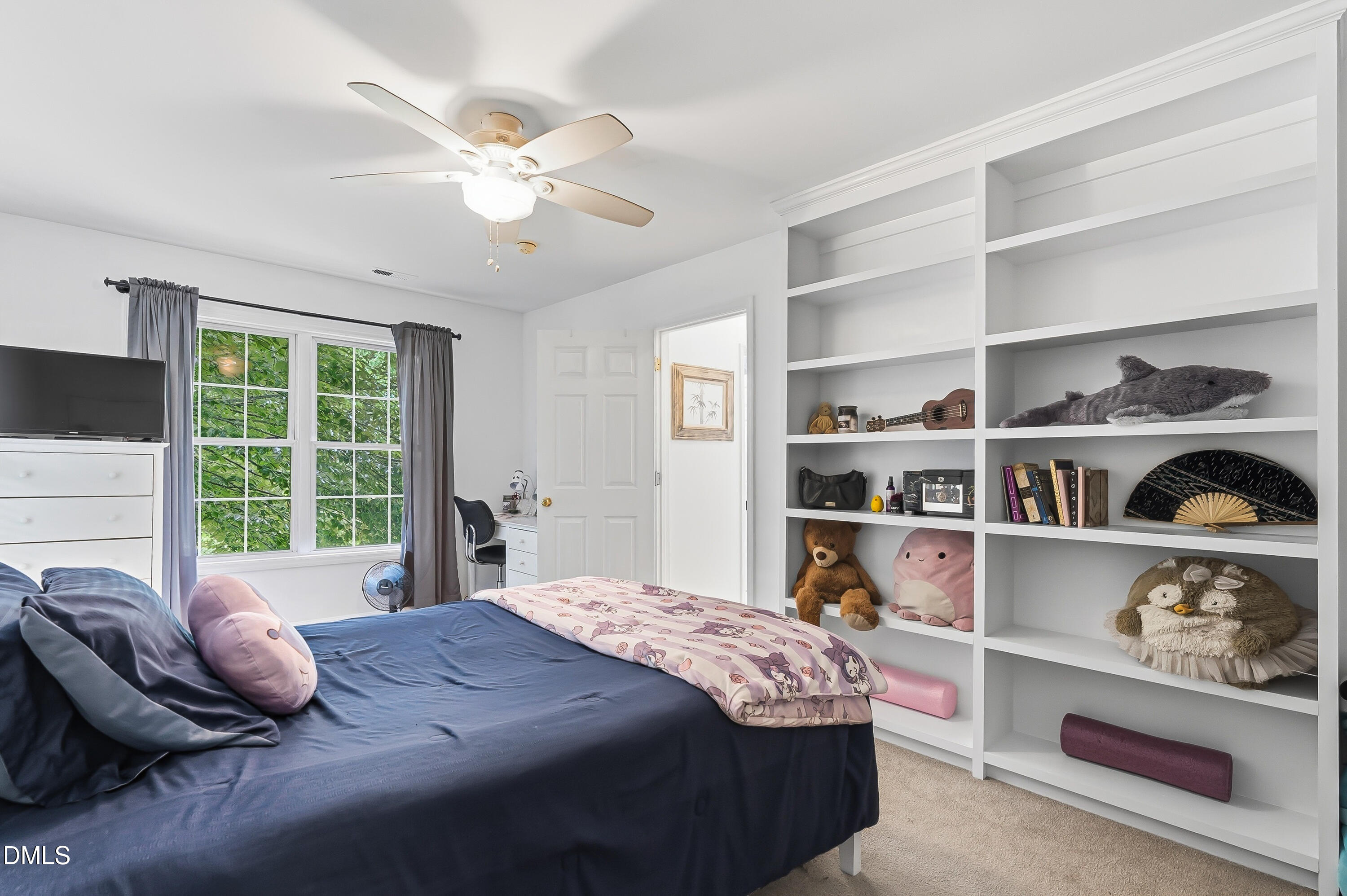 1214 Halcyon Place Rougemont, NC 27572 - Photo 30 of 69 a bedroom with a large bed and a window
