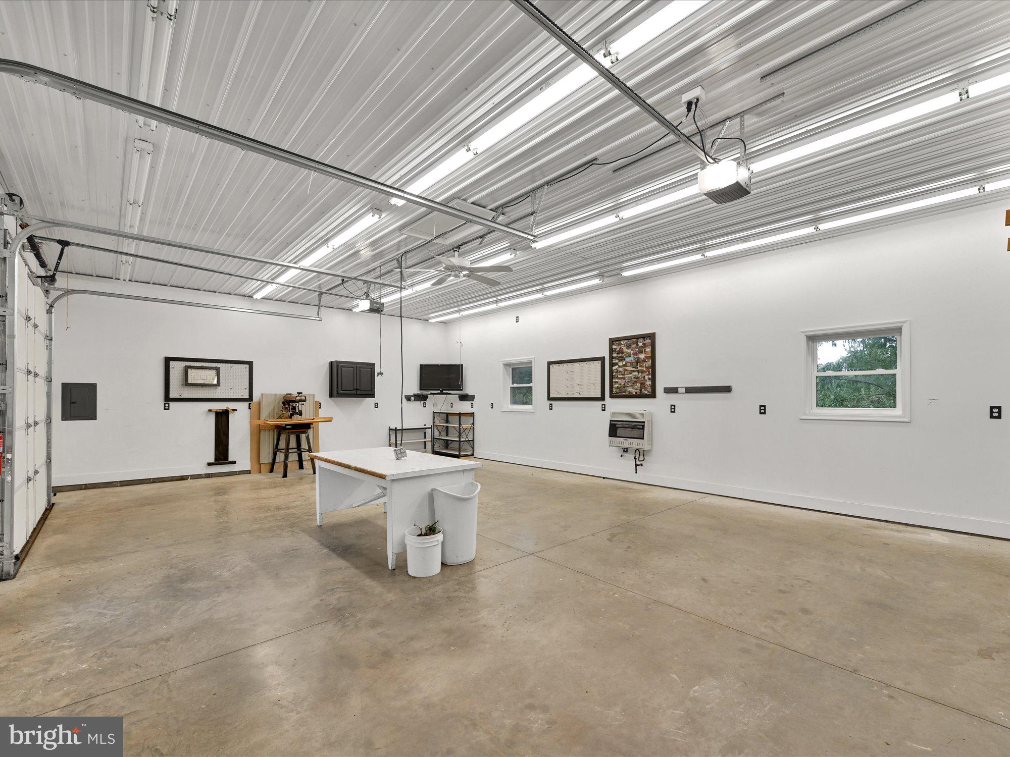 980 East Canal Road Dover, PA 17315 - Photo 33 of 39 Heated garage includes tv & mount